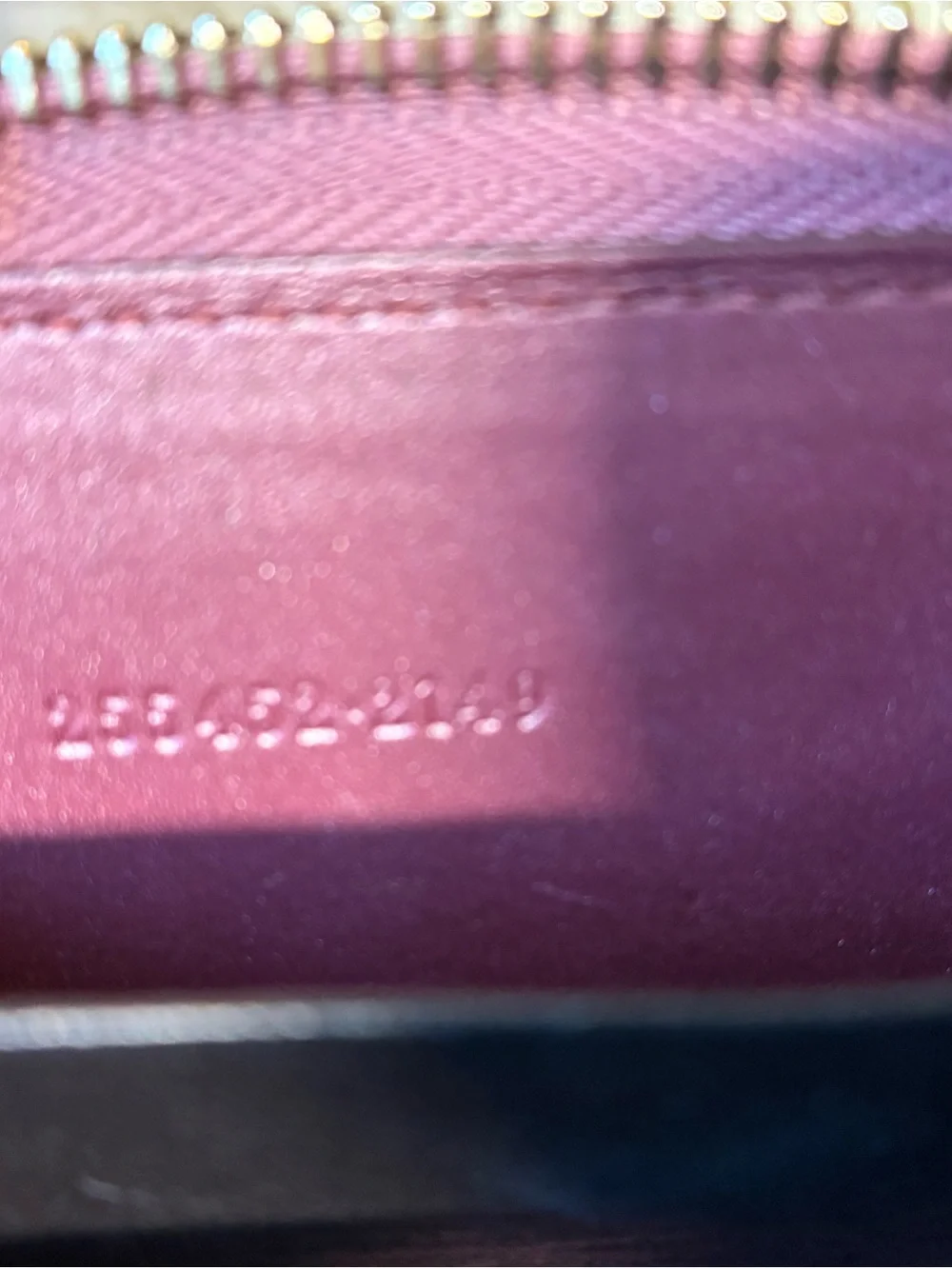 Gucci Plum GG Embossed Leather Zip Wallet with Gold Hardware